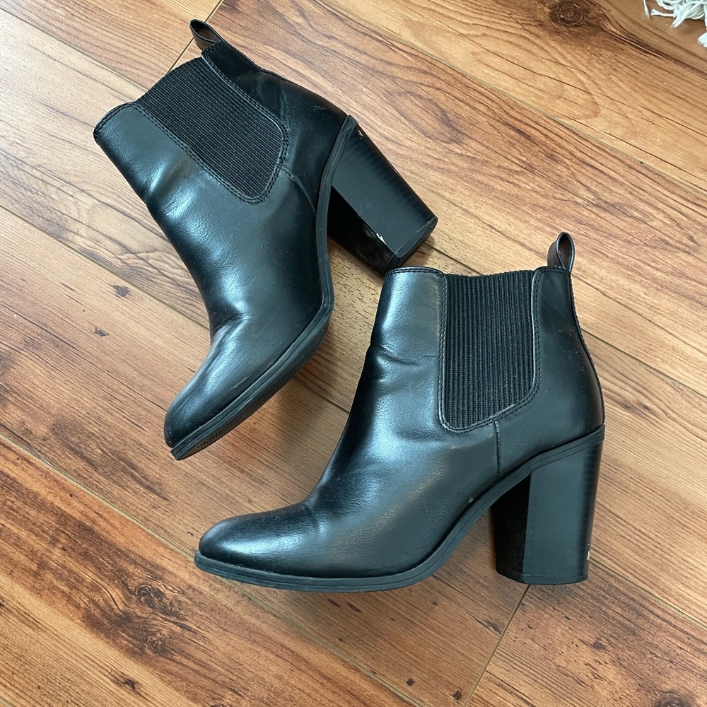 Black heeled slip on boots